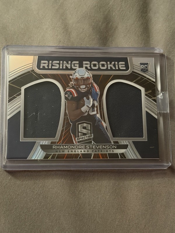 2021 Panini Spectra – Rising Rookie Materials Rhamondre Stevenson #RRM-RS /99