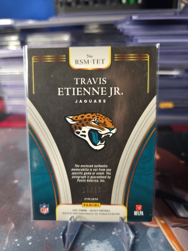2021 Panini Select - Rookie Signature Memorabilia Travis Etienne #RSM-TET Purple gallery