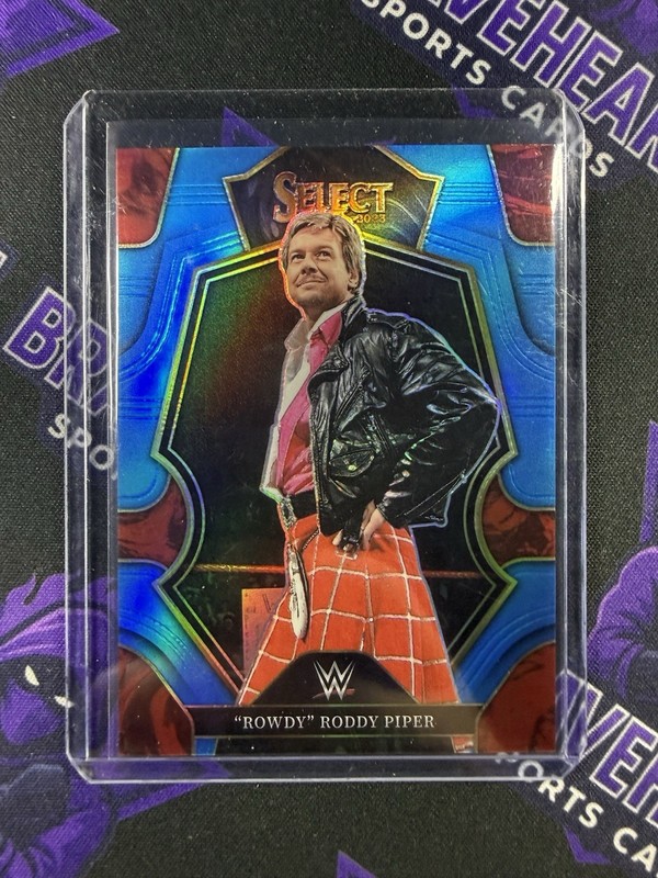 2023 Panini Select WWE Rowdy Roddy Piper Premier Light Blue #60/199