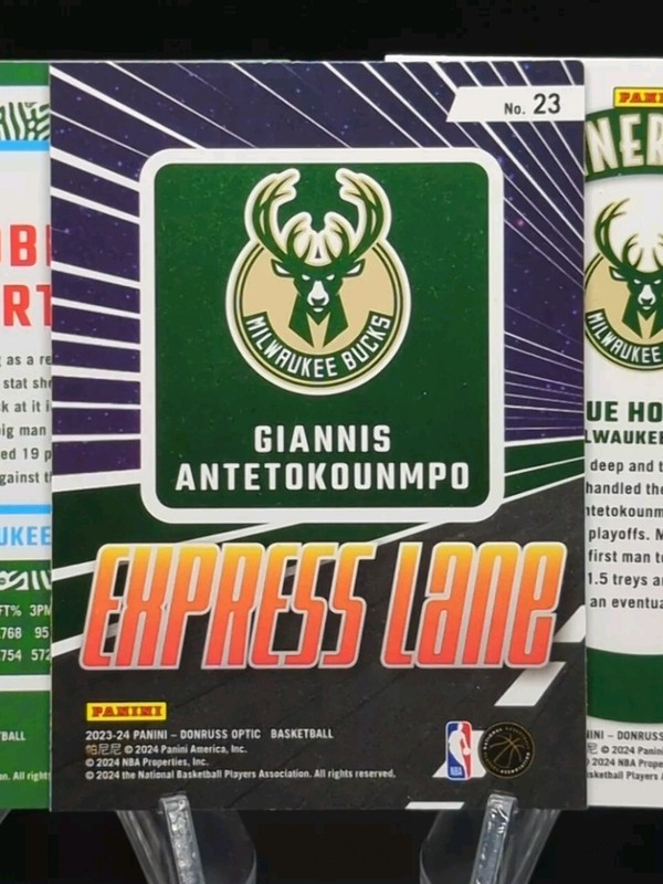 Giannis, Portis & Holiday 2023-24 Donruss Optic Purple Shock Parallel & Inserts gallery