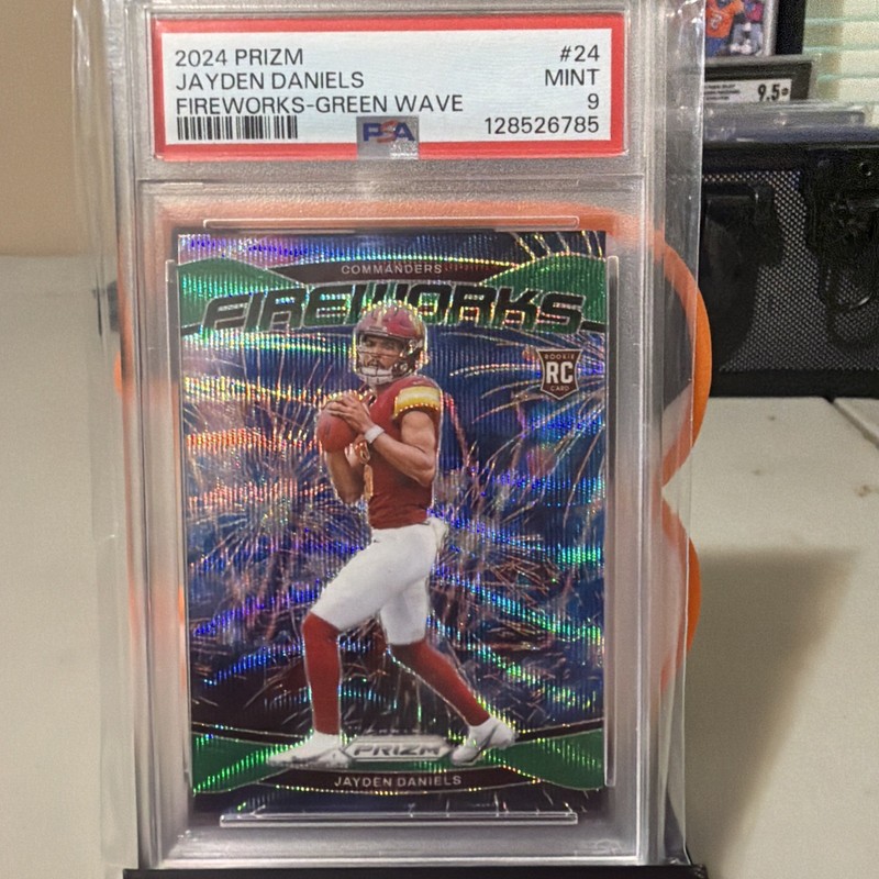 2024 Panini Prizm – Fireworks Jayden Daniels #24 Green Wave Prizm PSA Mint 9