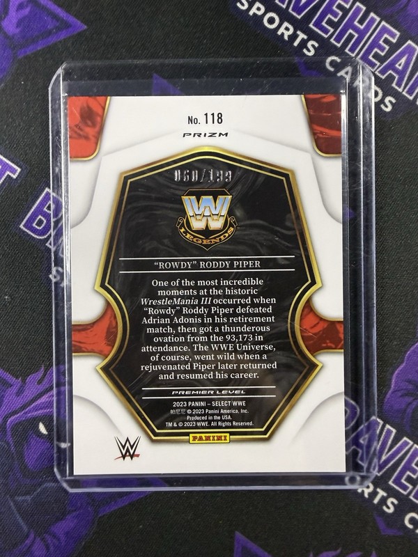 2023 Panini Select WWE Rowdy Roddy Piper Premier Light Blue #60/199 gallery