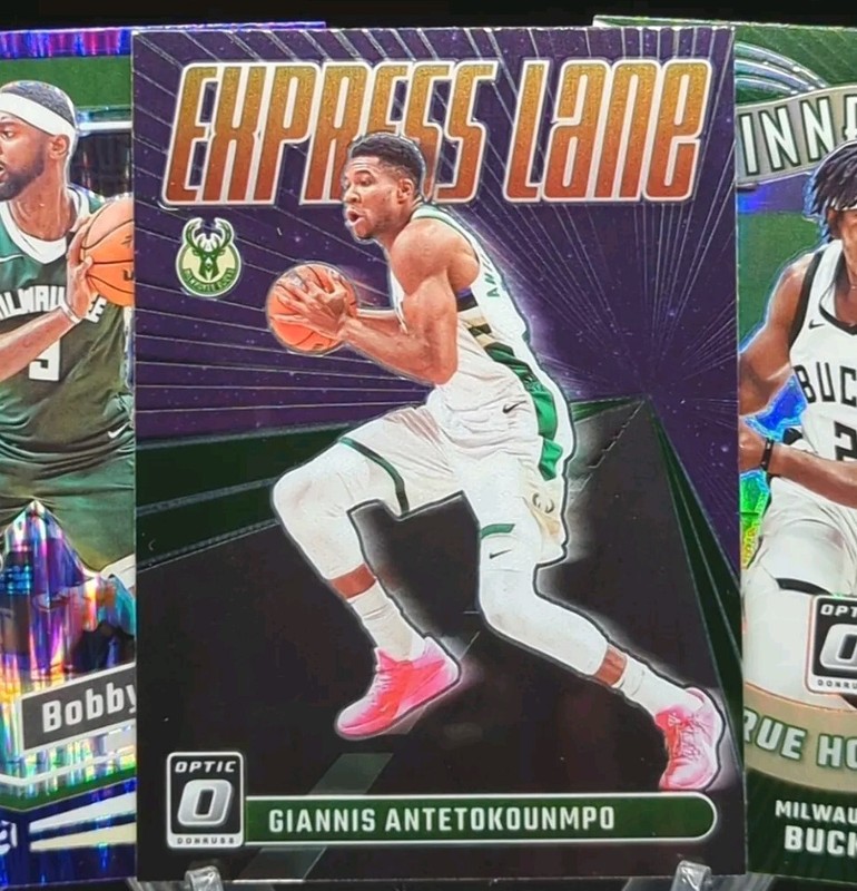 Giannis, Portis & Holiday 2023-24 Donruss Optic Purple Shock Parallel & Inserts gallery